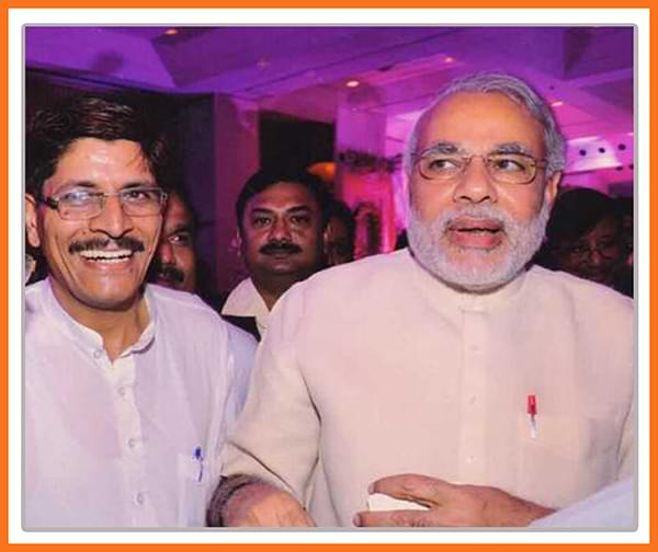 Narendra Modi with a political colleague